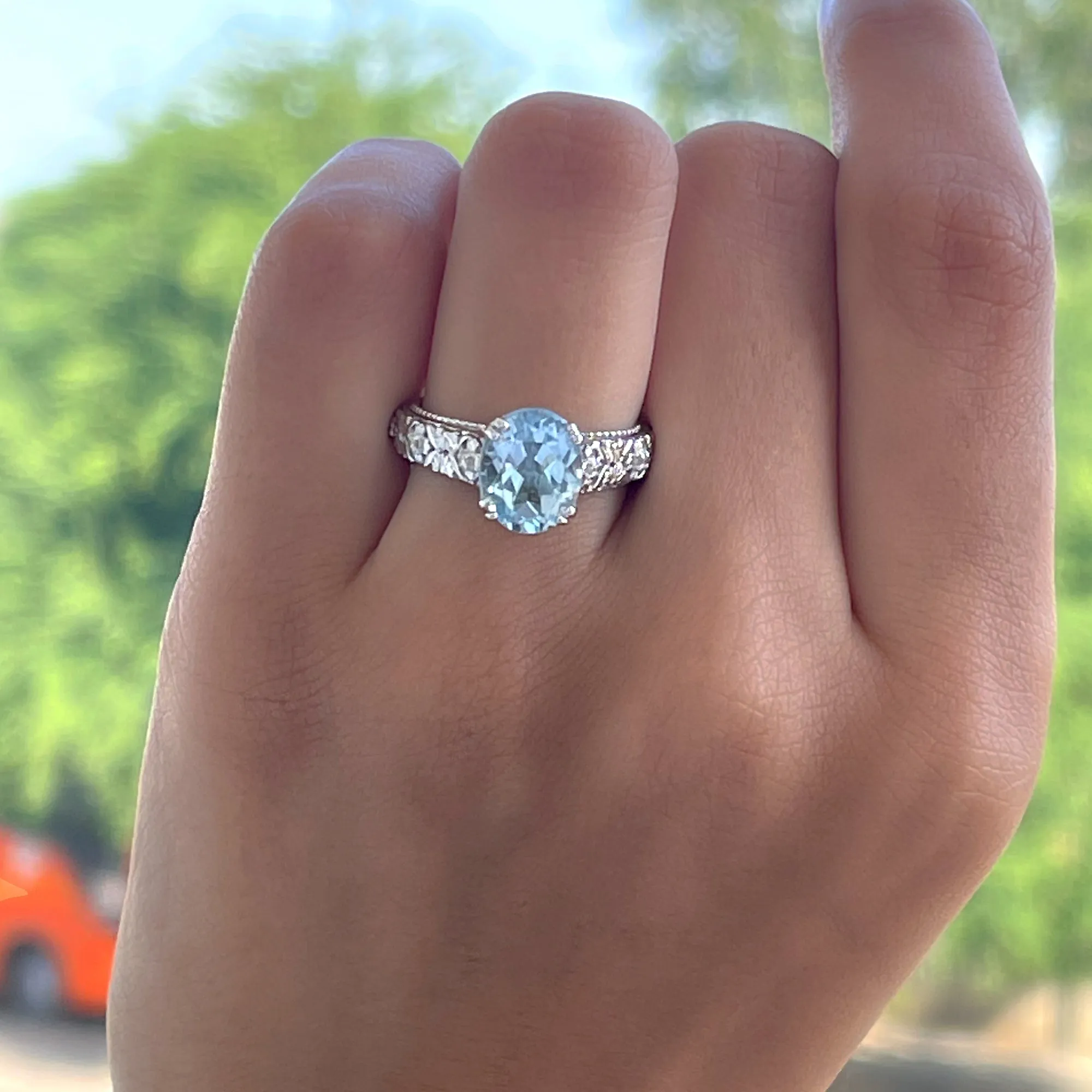 Oval Sky Blue Topaz and Diamond Vintage Style Solitaire Ring